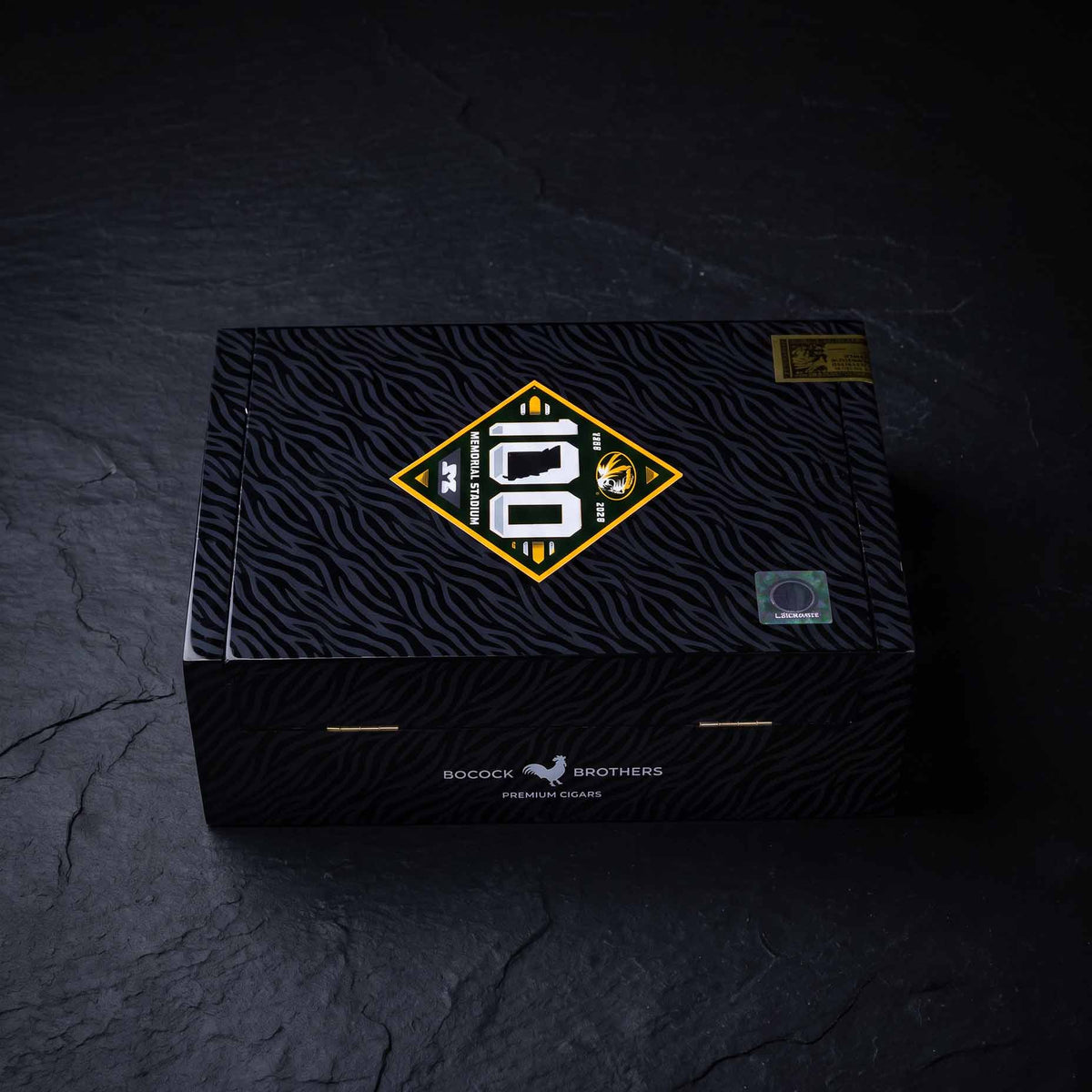 Mizzou Stadium Series Memorial Stadium 100 Year Celebration cigar box, closed, hand painted black and gold Mizzou Athletics box by Bocock Brothers
